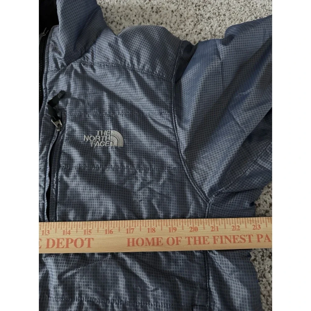 The North Face Mens Medium Blue Plaid Jacket With Built In Stow Away Bag Pocket